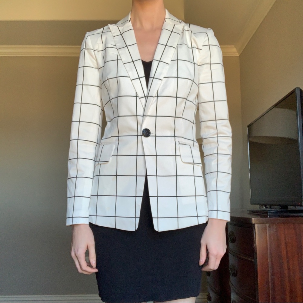 White blazer with black square lines